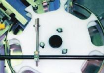 automatic bottle feeder / positioner for packing machine  Bivans Corporation