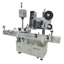 automatic labeler for cylindrical products Trunnion series Label Aire, Inc.