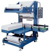 automatic sleeve wrapping machine (with heat shrink film) SBM 6030 American Packaging & Plant Equipment