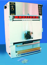 bag filler and sealer (semi-automatic, open mouth bags) max. 20 p/min | 575B Rollbag&trade; Clamco