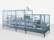 filler for solids and sealer for pre-formed packaging (food products) max. 40 p/min | DA J+P Maschinenbau
