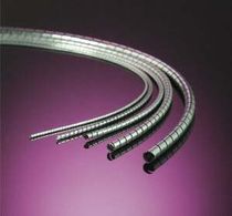 groove mounted EMI shielding gasket  Spira