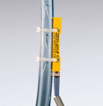 inductive clamp-on tube sensor for in tube moving part detection          TURCK