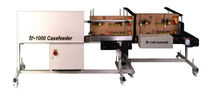 inkjet coding marking machine for cardboard boxes 20 - 45 p/min, 3300 x 1575 x 1150 mm | TR-1000 casefeeder Travtec Limited