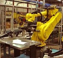 loading / unloading robotic cell for CNC machine  Wes-Tech