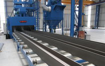 shot blasting machine with roller conveyor for plates, sections and structures LAUCO OMSG - OFFICINE MECCANICHE SAN GIORGIO SpA