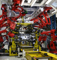 spot welding machine  COMAU Robotics