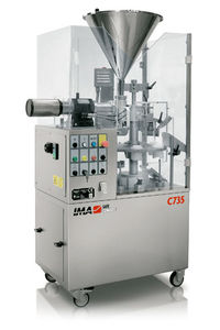 gravity filler / pipe / semi-automatic / food