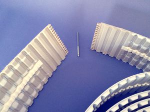 trapezoidal belt / stainless steel / for food industry machinery
