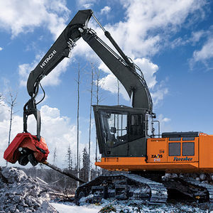 swing-arm log loader / crawler