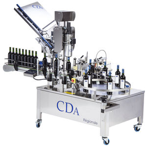 automatic labeler / for self-adhesive labels / side / for bottles