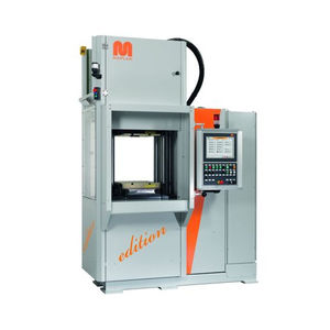 vertical injection molding machine / hydraulic / for rubber / for silicone rubber