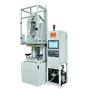 vertical injection molding machine / hydraulic / for rubber / tie-bar-less