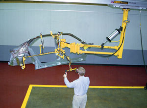 pneumatic manipulator / with orbital end effector / for auto parts handling / overhead rail-mounted
