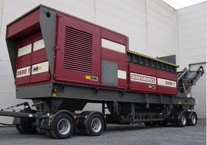 double-shaft shredder / for wood / mobile