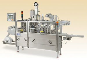 roll-fed thermoforming machine / for packaging / automated / industrial