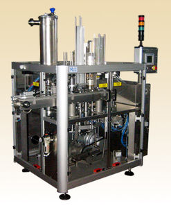 liquid filling and sealing machine / for pre-formed containers