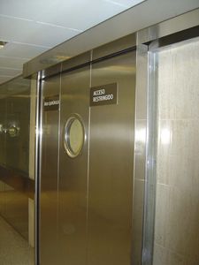 sliding doors / stainless steel / anodized aluminum / indoor