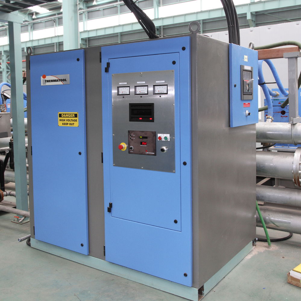 Metal pipe induction heater Thermatool Europe for heat treatment