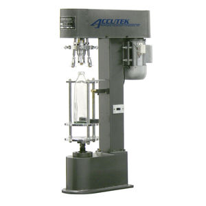 pressure capping machine / semi-automatic / for plastic bottles / for the food industry