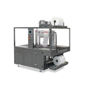 continuous-motion sleeve wrapping machine