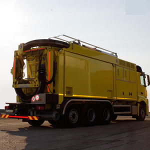 solid and liquid material suction excavator 1
