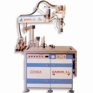 vertical tapping machine