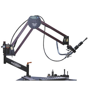 swing-arm tapping machine