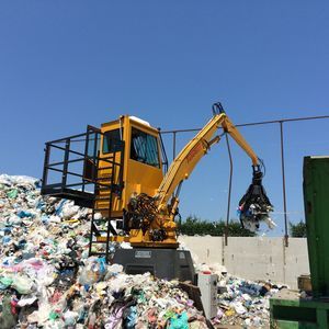stationary material handler