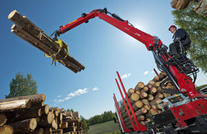 swing-arm log loader