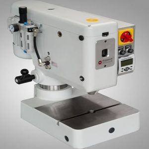 pneumatic riveting machine