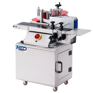 automatic labeler / side / for bottles / for the cosmetics industry