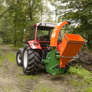 tractor-mounted wood chipper