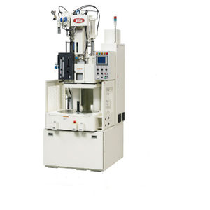 vertical injection molding machine / hydraulic / for elastomers