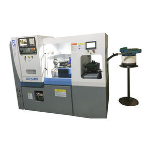 lathe with integrated bar feeder
