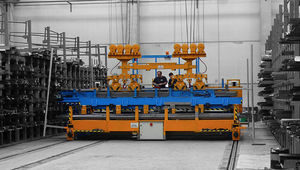 rail guided vehicle with automatic positioning