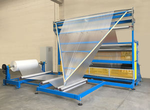 unwinding-rewinding machine