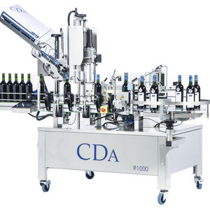 automatic labeler / for self-adhesive labels / side / for bottles