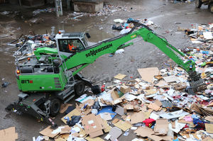 wheel-mounted material handler / electric / hydraulic / diesel fuel