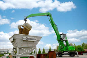 wheel-mounted material handler
