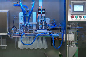 multi-head filling and capping machine
