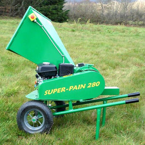 tractor-mounted wood chipper