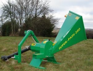 tractor-mounted wood chipper
