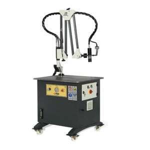 swing-arm tapping machine