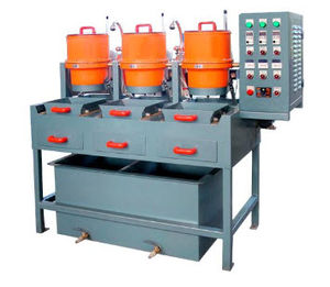 centrifugal vibratory finishing machine