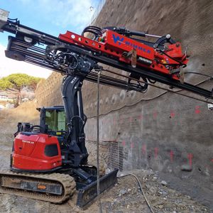 excavator drill attachment