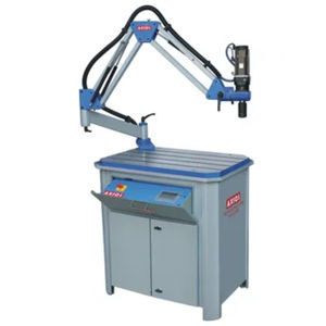 swing-arm tapping machine