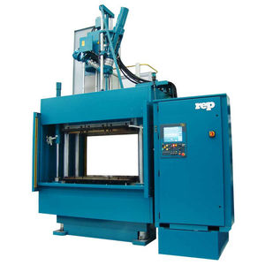 vertical injection molding machine / hydraulic / for parts with insert