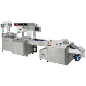 roll-fed热成型机器