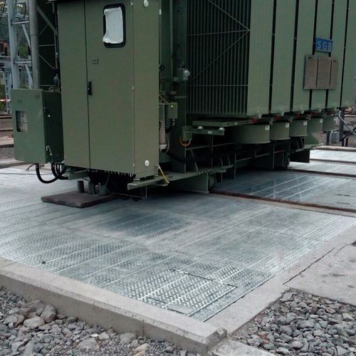 fire extinguishing cover for concrete pit under electrical transformer with baffles plates - Groupe SANERGRID